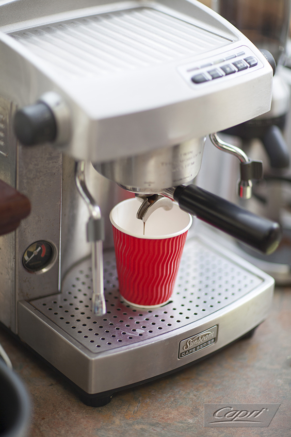 Red Cool Wave Hot Cup on a Coffee Machine